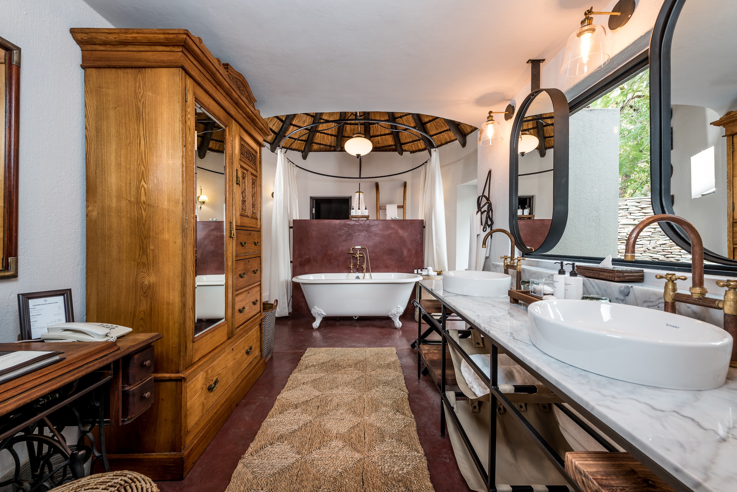 <p>The bathroom is designed to provide guests with a comfortable and relaxing environment, allowing them to unwind and rejuvenate after a day of safari activities.</p>